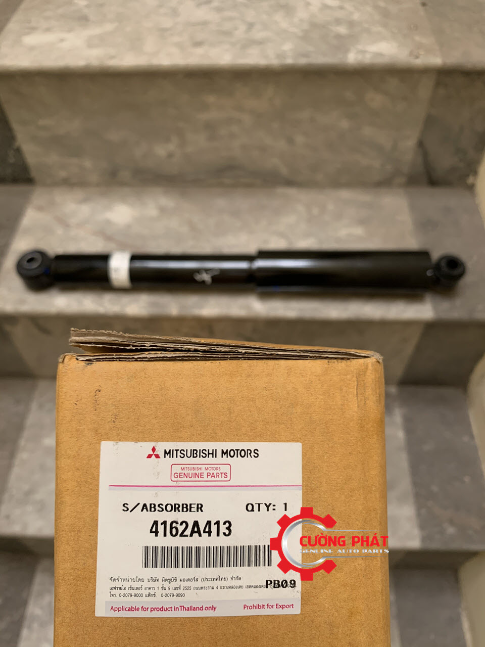 giam-xoc-sau-Mitsubishi-Pajero-Sport Mã phuộc nhún sau Pajero Sport chính hãng