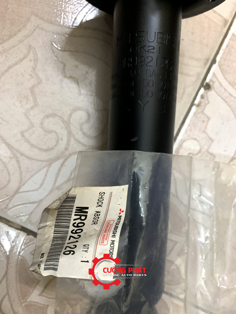 Giam-xoc-Mitsubishi-Pajero-V93-MR992126-phuoc-nhun Mã giảm xóc trước Pajero V93 ngân hàng chính hãng