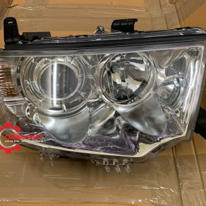 Hình ảnh đèn pha Mitsubishi Pajero Sport 2013-2018 chính hãng