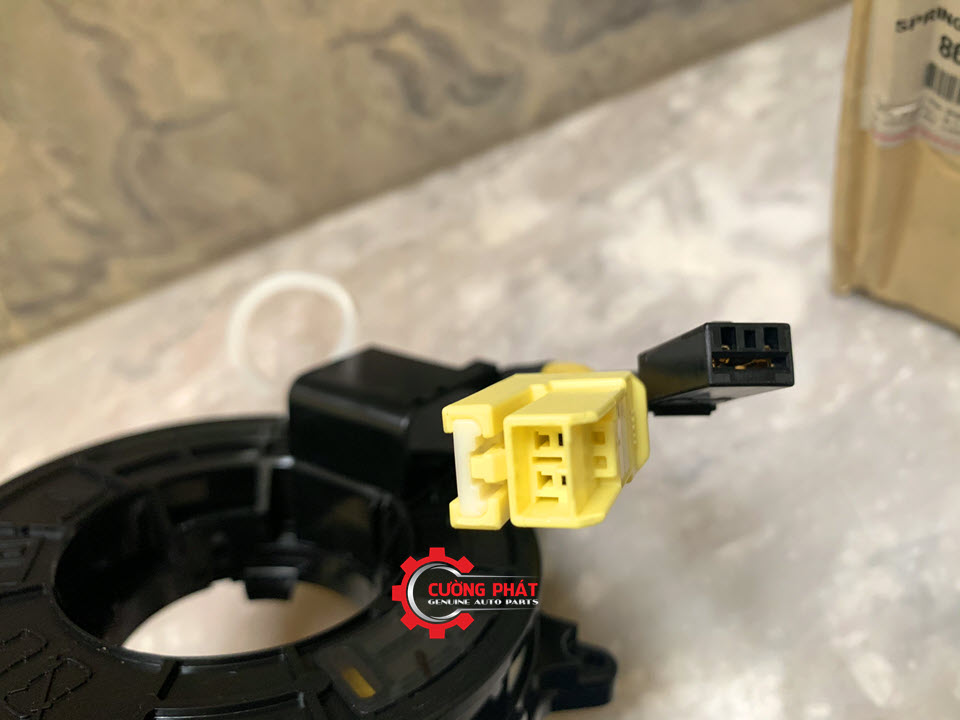 Cuon-cap-coi-vo-lang-Mitsibishi-Triton-Pajero-Sport-Grandis-Zinger-8619A016-cuon-day-tui-khi (2) Cận cảnh giắc cuộn cáp còi vô lăng Triton, Pajero Sport, Zinger, Grandis chính hãng
