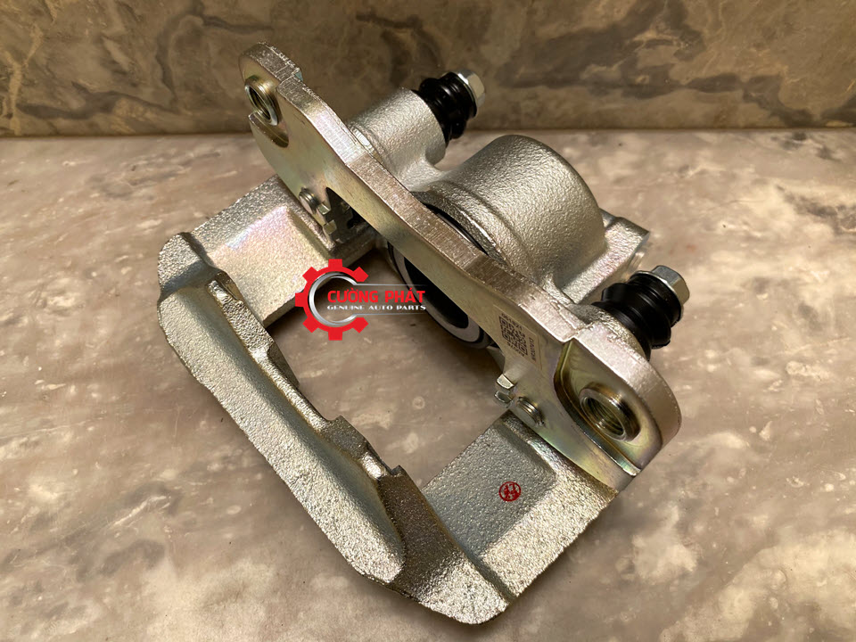Cum-gong-phanh-sau-Mitsubishi-Pajero-Sport-MR307413-MR307414 (1) Hình ảnh cụm gông phanh sau Mitsubishi Pajero Sport chính hãng