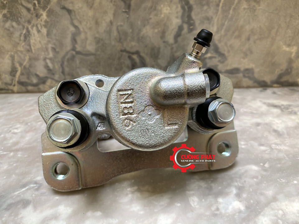 Cum-gong-phanh-sau-Mitsubishi-Pajero-Sport-MR307413-MR307414 (3) Cận cảnh cụm gông phanh sau Pajero Sport chính hãng