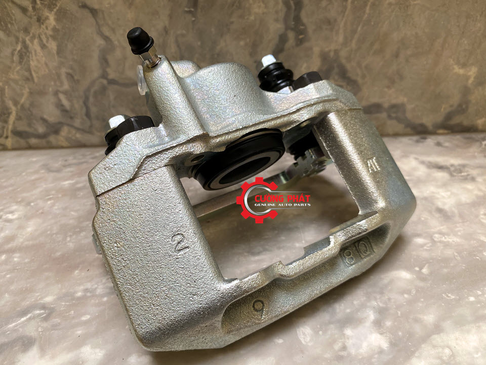 Cum-gong-phanh-sau-Mitsubishi-Pajero-Sport-MR307413-MR307414 Chi tiết cụm gông phanh sau Pajero Sport chính hãng