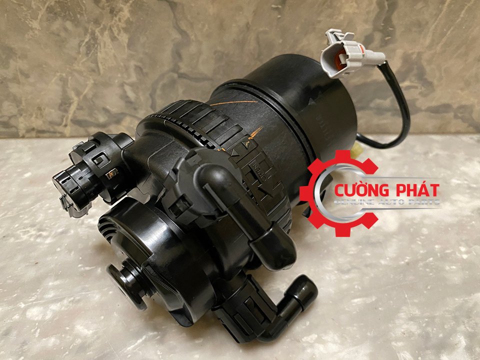 Cum-loc-nhien-lieu-Mitsubishi-Triton-Pajero-Sport-loi-giay-1770A289 (2) Cận cảnh cụm lọc nhiên liệu lõi giấy Triton, Pajero Sport chính hãng