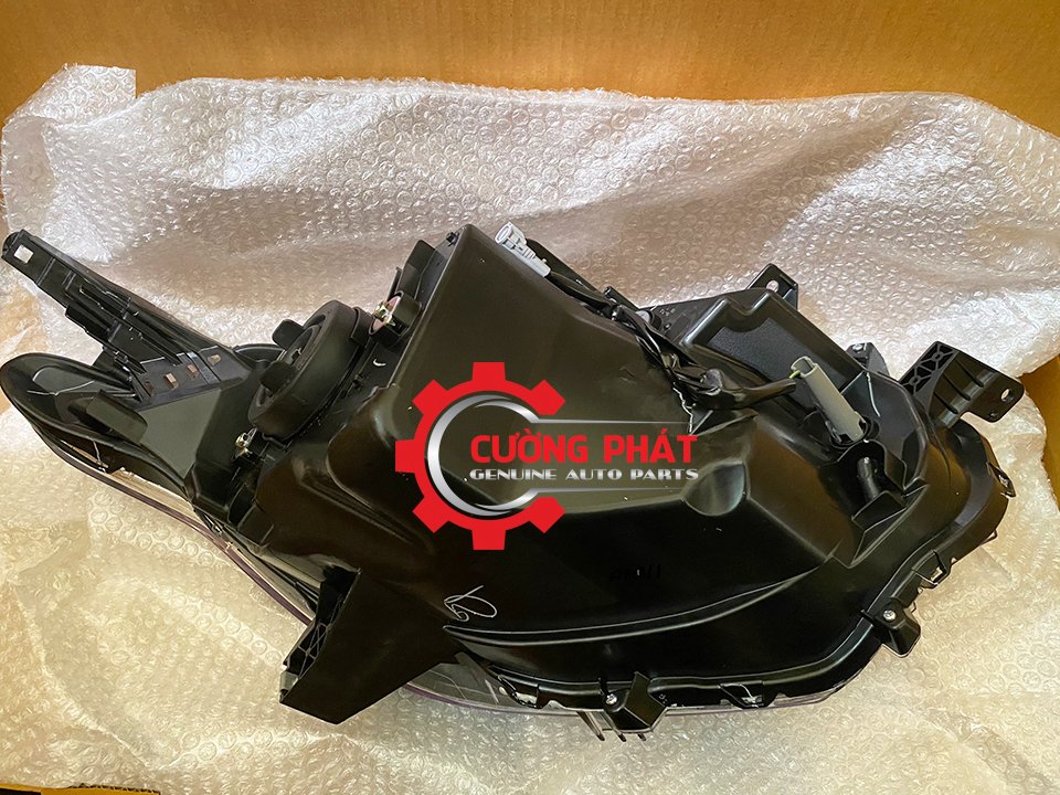 Den-pha-Mitsubishi-Triton-2015-2018-8301C723-8301C724-8301C725-8301C726 (3) Mặt sau đèn pha mí vàng đậm Triton 2015-2018 chính hãng