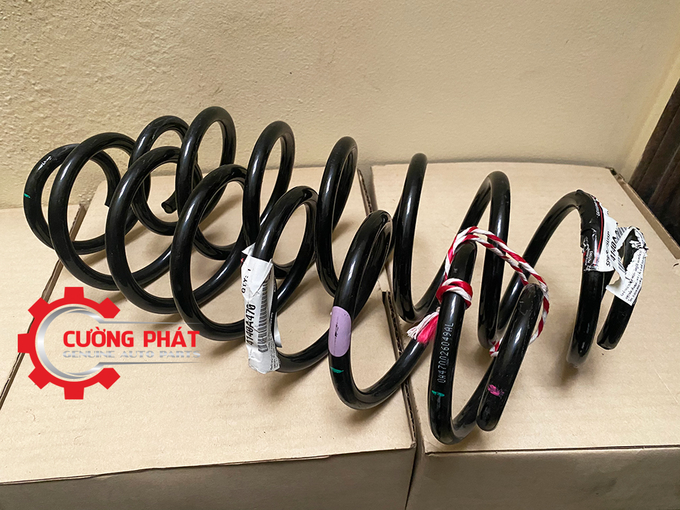 Lo-xo-giam-xoc-sau-Mitsubishi-Attrage-Mirage-4140A470 (1) Hình ảnh lò xo giảm xóc sau Mitsubishi Attrage, Mirage chính hãng