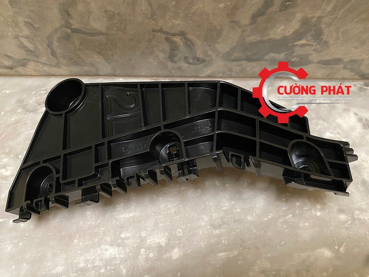 Gia-cai-can-truoc-Mitsubishi-Xpander-2022-2023-6400L220-6400L219 (1) Cận cảnh giá cài cản trước Xpander 2022-2023 chính hãng